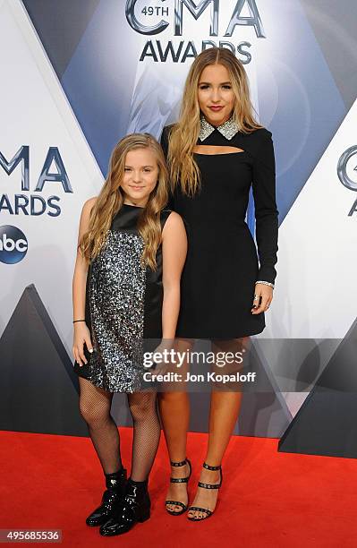 Actresses Maisy Stella and Lennon Stella attend the 49th annual CMA Awards at the Bridgestone Arena on November 4, 2015 in Nashville, Tennessee.