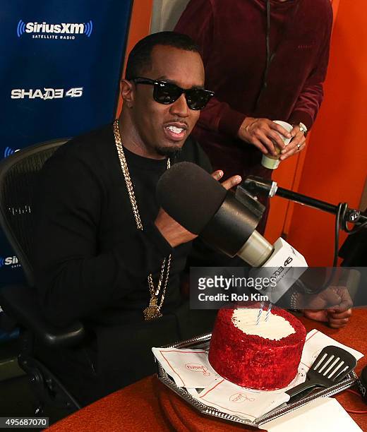 Sean "Puff Diddy" Combs is given a cake for his birthday during his visit to SiriusXM Studios on November 4, 2015 in New York City.