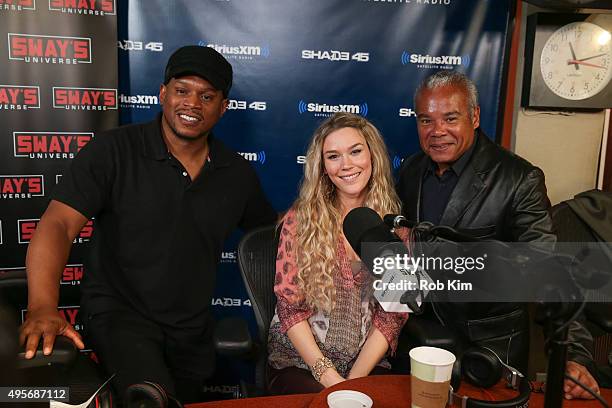 Joss Stone poses with host, Sway Calloway and Ruben Rodriguez during a visit to 'Sway in the Morning' with Sway Calloway on Eminem's Shade 45 at...