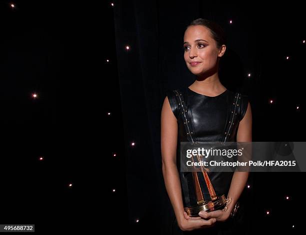 Actress Alicia Vikander, winner of the Hollywood Breakout Actress Award for "The Danish Girl", poses backstage at the 19th Annual Hollywood Film...