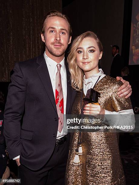 Actor Ryan Gosling and New Hollywood Award honoree Saoirse Ronan backstage at the 19th Annual Hollywood Film Awards at The Beverly Hilton Hotel on...
