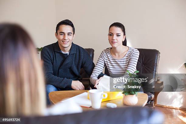 marriage therapy. couple talking to counselor - couple counselling stock pictures, royalty-free photos & images