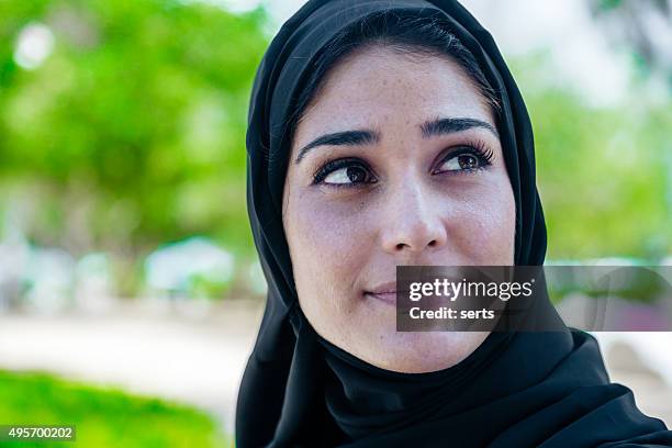 beautiful arab woman in smiling portrait outdoor - saudi grandfather stock pictures, royalty-free photos & images