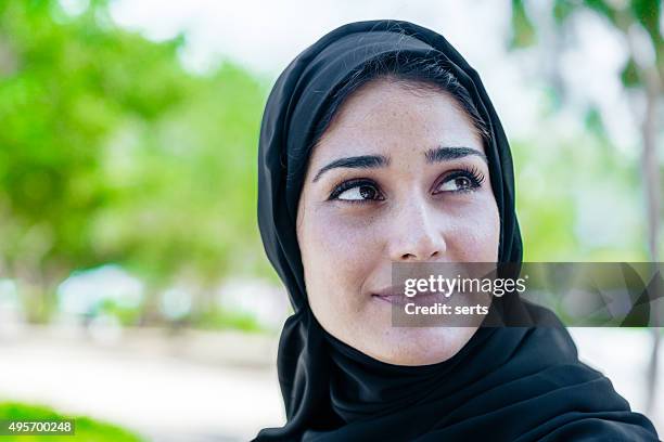 beautiful arab woman in smiling portrait outdoor - saudi grandfather stock pictures, royalty-free photos & images