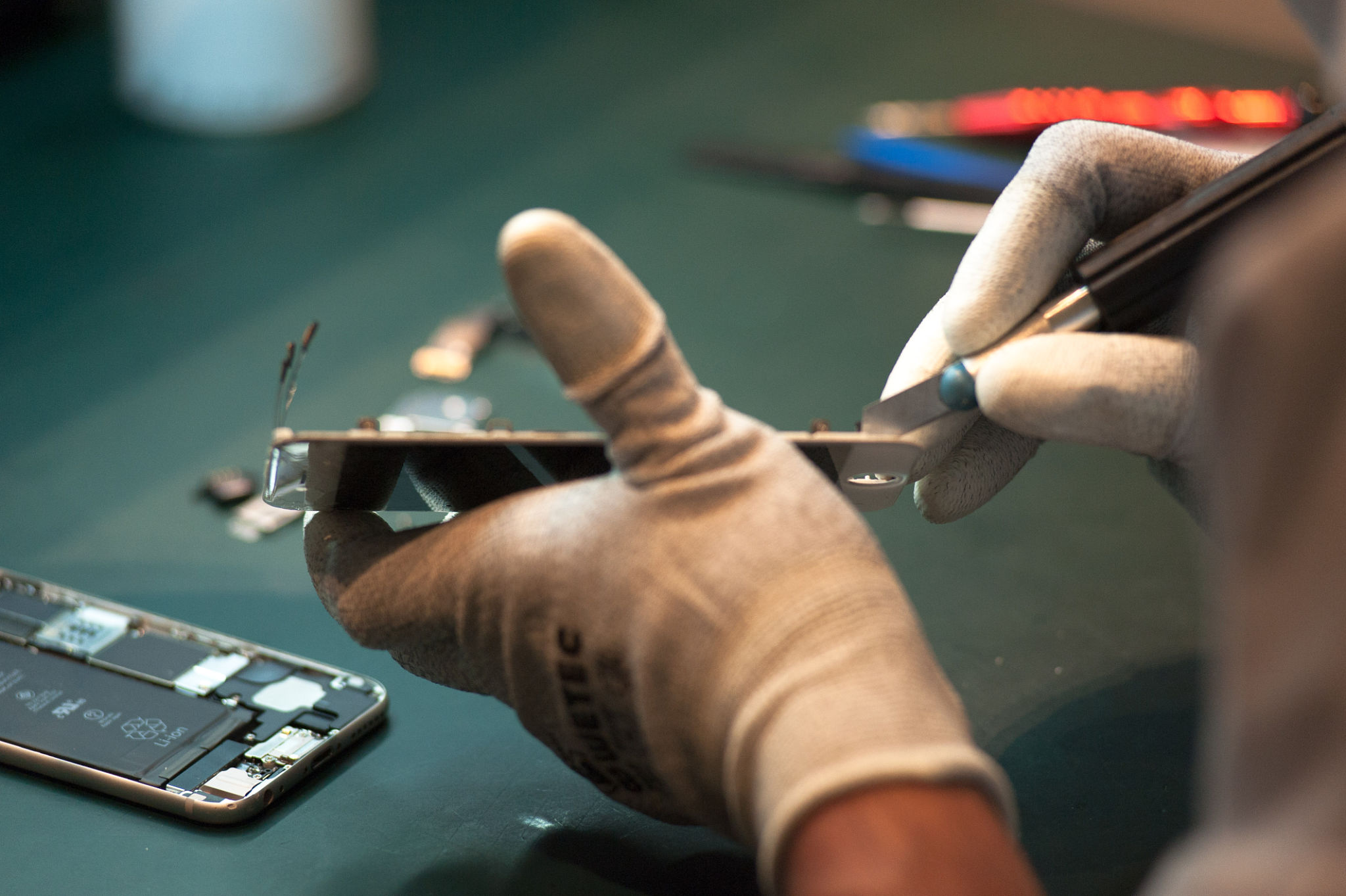 technician repairing phone