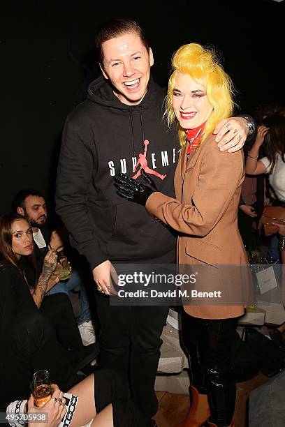 Professor Green and Pam Hogg attend the launch of Zebrano Restaurant on November 4, 2015 in London, England.