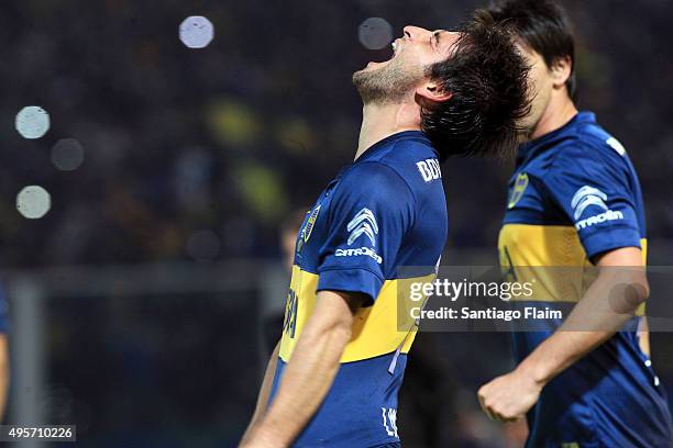 Nicolas Lodeiro of Boca Juniors celebrates after scoring the opening goal through a penalty kick during a final match between Boca Juniors and...