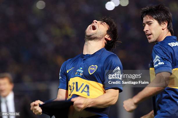 Nicolas Lodeiro of Boca Juniors celebrates after scoring the opening goal through a penalty kick during a final match between Boca Juniors and...