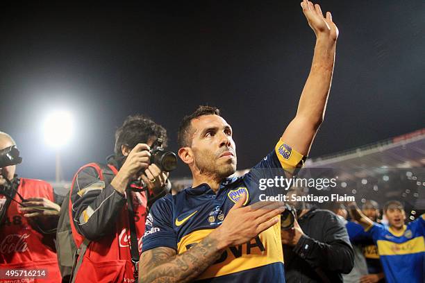 Carlos Tevez of Boca Juniors greets the fans after winning a final match between Boca Juniors and Rosario Central as part of Copa Argentina 2015 at...