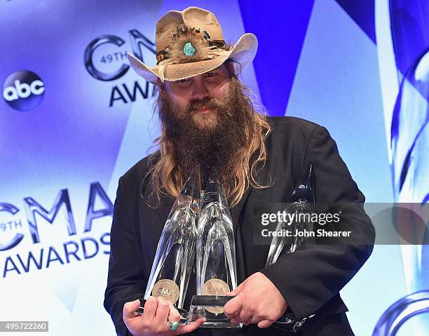 Male Vocalist of the Year winner Chris Stapleton poses in the press room during the 49th annual CMA Awards at the Bridgestone Arena on November 4,...