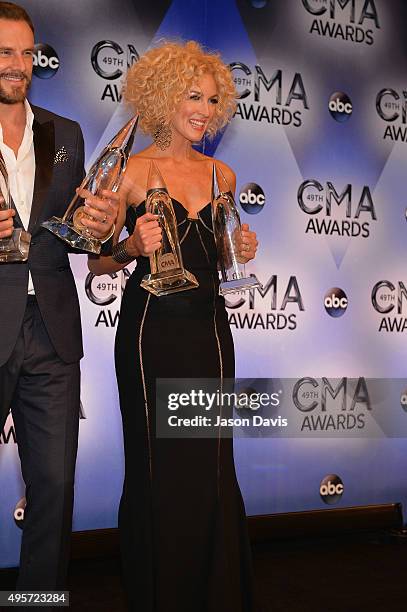 Vocal Group of the Year winners Jimi Westbrook and Kimberly Schlapman, of Little Big Town pose in the press room during the 49th annual CMA Awards at...