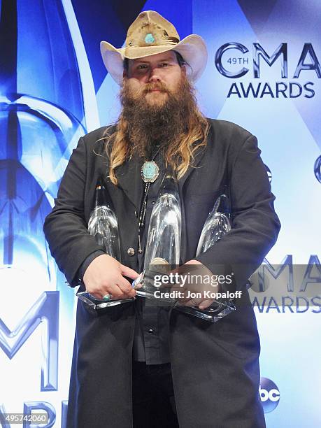 Singer Chris Stapleton poses in the press room at the 49th annual CMA Awards at the Bridgestone Arena on November 4, 2015 in Nashville, Tennessee.