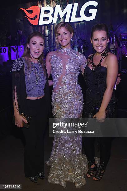 Maddie Marlow and Tae Dye of musical duo Maddie & Tae pose with Singer Cassadee Pope as Big Machine Label Group celebrates The 49th Annual CMA Awards...