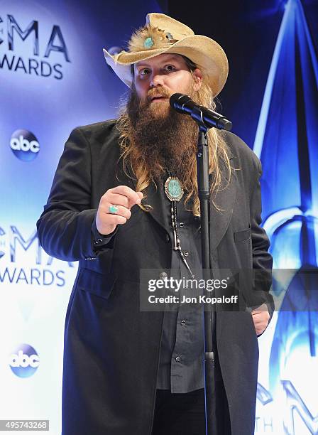 Singer Chris Stapleton poses in the press room at the 49th annual CMA Awards at the Bridgestone Arena on November 4, 2015 in Nashville, Tennessee.