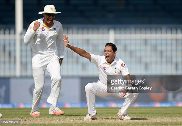 Zulfiqar Babar of Pakistan celebrates alongside captain Misbah-ul-Haq after dismissing Samit Patel of England during day five of the 3rd Test between...
