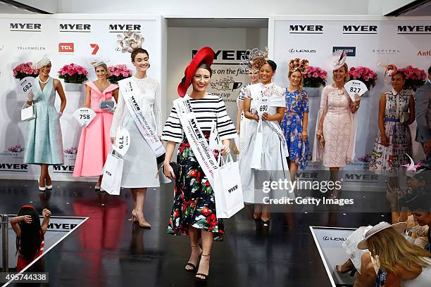 Myer Fashions on the Field Women's Racewear Award winner Georgia Gardiner , second runner up Bridget Fitzgerald and first runner up Regina Thai pose...