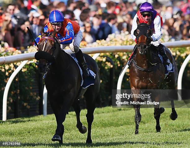 Jockey Jamie McDonald riding Zebrinz wins with retiring jockey Jim Cassidy behind on Distant Rock the Crown Resorts Plate on Oaks Day at Flemington...