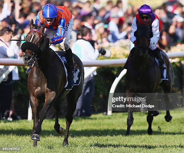 Jockey Jamie McDonald riding Zebrinz wins with retiring jockey Jim Cassidy behind on Distant Rock the Crown Resorts Plate on Oaks Day at Flemington...