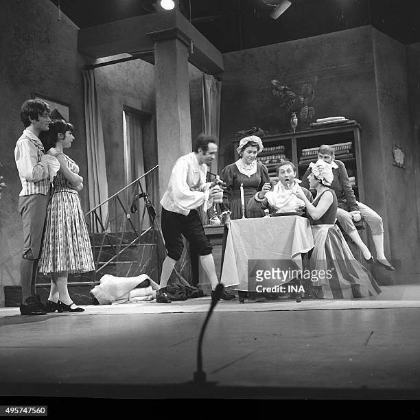 Jacqueline Rouillard, Balutin Jacques, Annick Alane, André Gille, Arlette Gilbert and Jean Michel Mole in a scene of the "Hussars", the play staged...