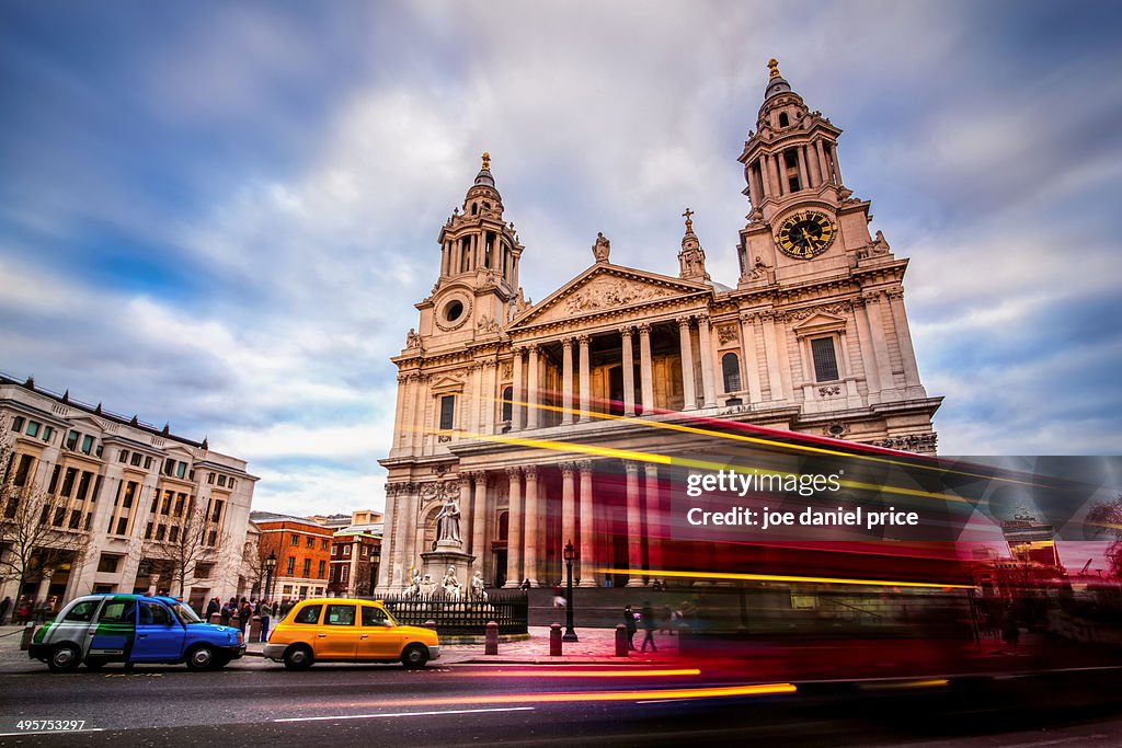 Bus passing St Paul's Cathedral, London
