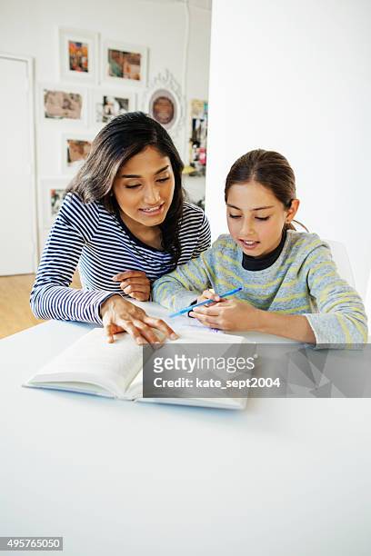 learning with tutor - 2004 2015 stock pictures, royalty-free photos & images