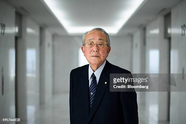 Billionaire Kazuo Inamori, founder of Kyocera Corp., poses for a photograph in Kyoto, Japan, on Friday, Oct. 23, 2015. Inamori established...