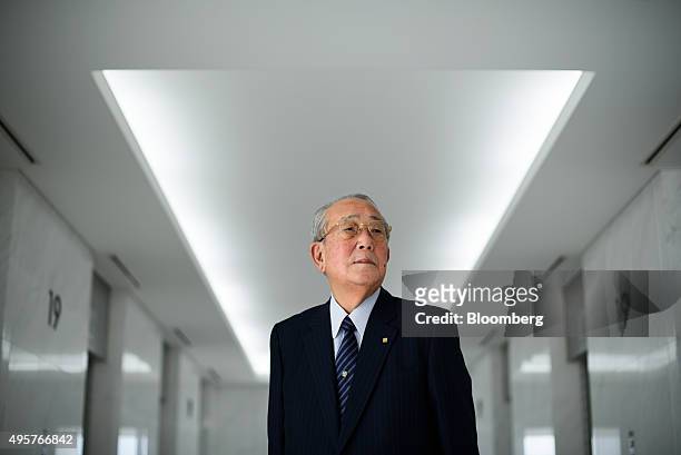 Billionaire Kazuo Inamori, founder of Kyocera Corp., poses for a photograph in Kyoto, Japan, on Friday, Oct. 23, 2015. Inamori established...