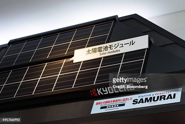 Solar panel manufactured by Kyocera Corp. Is displayed in a showroom at the company's headquarters in Kyoto, Japan, on Friday, Oct. 23, 2015....