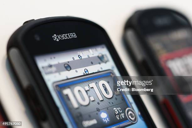 Smartphones manufactured by Kyocera Corp. Are displayed in a showroom at the company's headquarters in Kyoto, Japan, on Friday, Oct. 23, 2015....