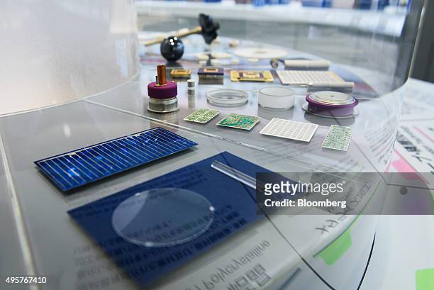 Ceramic products manufactured by Kyocera Corp. Are displayed in a showroom at the company's headquarters in Kyoto, Japan, on Friday, Oct. 23, 2015....