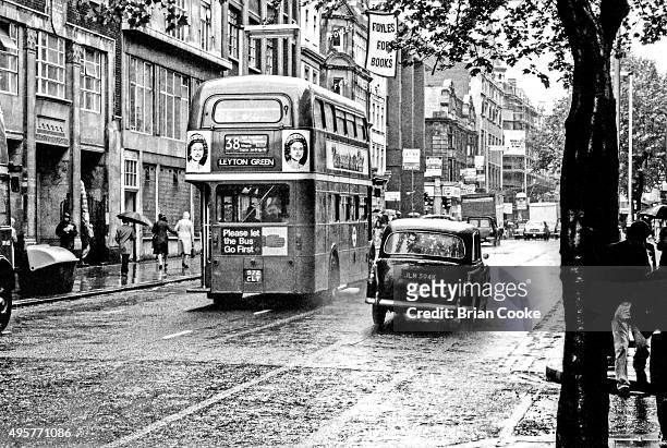 London bus in Charing Cross Road, central London, June 1977, carrying posters for the English punk rock band the Sex Pistols' single 'God Save The...