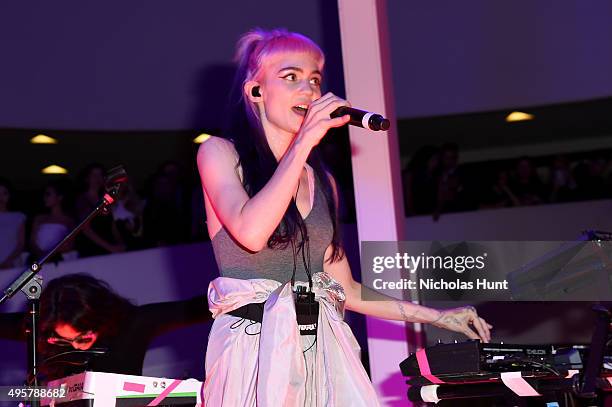 Grimes, performs at the 2015 Guggenheim International Gala Pre-Party made possible by Dior at Solomon R. Guggenheim Museum on November 4, 2015 in New...