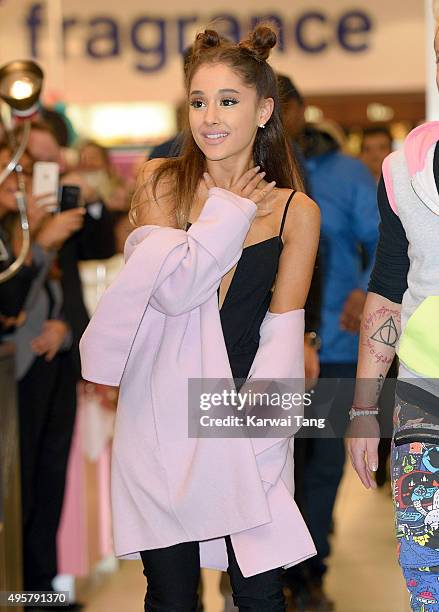 Ariana Grande attends a photocall to support the launch of her debut fragrance, Ari by Ariana Grande and also meet and greet her fans at Boots,...