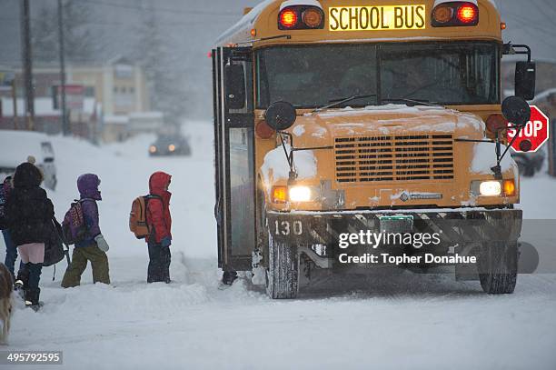 Snow Day Bus Rider School Kids In Snow Photos and Premium High Res Pictures - Getty Images