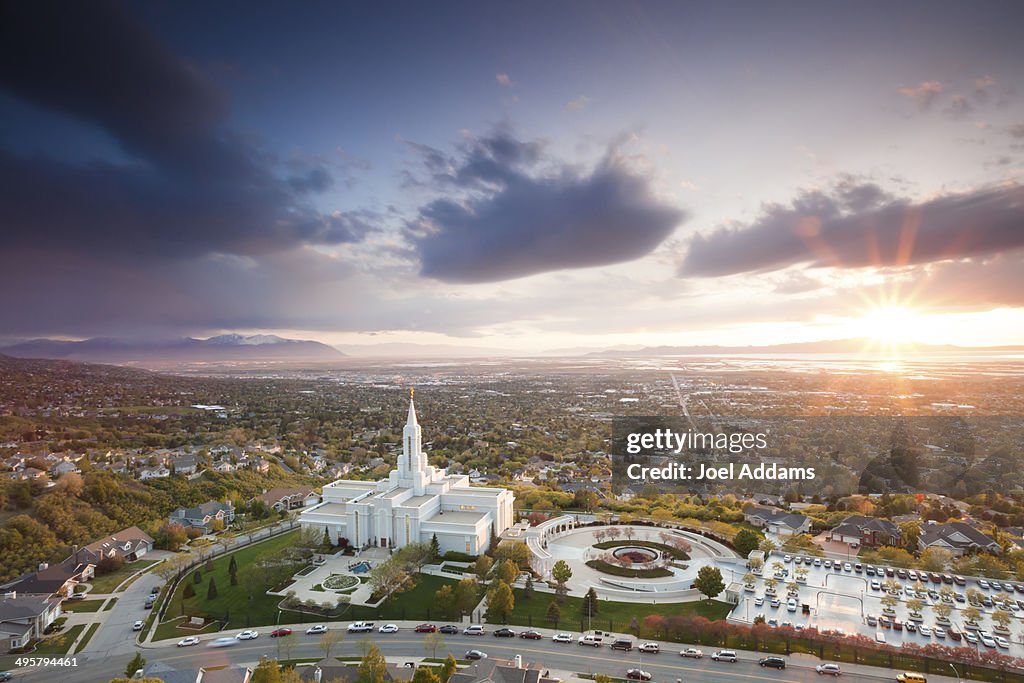 The Mormon (LDS) Temple in Bountiful Utah sits above the Great Salt Lake at dusk.