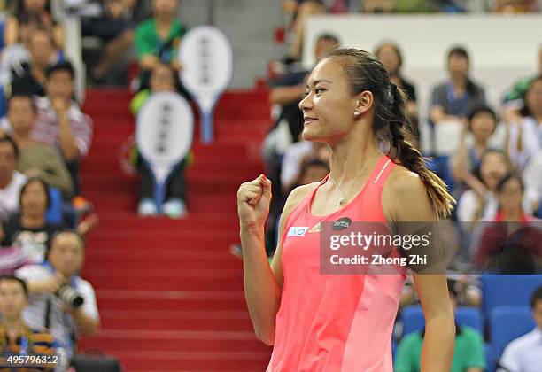 Shilin Xu of China reacts with Xiaodi You of China during the doubles match against Gabriela Dabrowski of Canada and Alicja Rosolska of Poland on day...