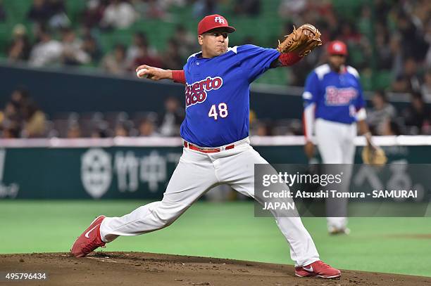 Andres Manuel Santiago Rondon of Puerto Rico pitches in the top half of the first inning during the send-off friendly match for WBSC Premier 12...