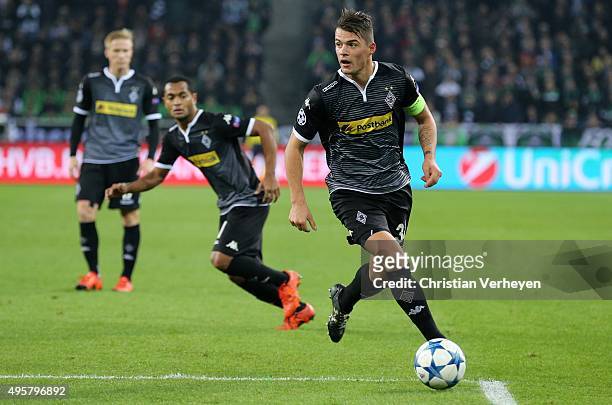 Granit Xhaka of Borussia Moenchengladbach controls the ball during the UEFA Champions League group stage match between Borussia Moenchengladbach and...