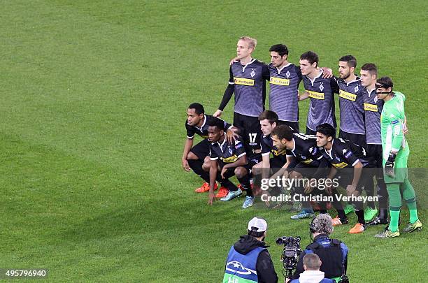 The Team of Borussia Moenchengladbach pose ahaed the UEFA Champions League group stage match between Borussia Moenchengladbach and Juventus Turin at...