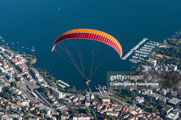 aerial view, paraglider, marina, lake maggiore, locarno, kanton tessin, switzerland - kanton tessin stock pictures, royalty-free photos & images