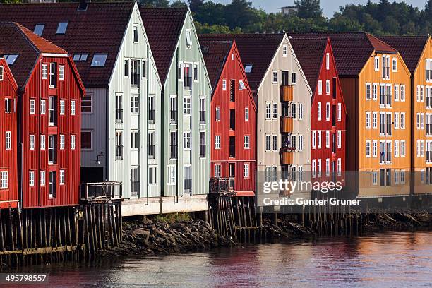 old wooden warehouses at the nidelva river, trondheim, sor-trondelag, trondelag, norway - sor trondelag county stock pictures, royalty-free photos & images