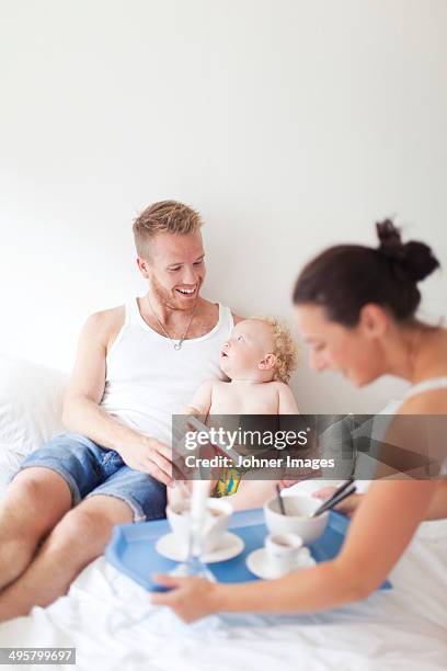 family breakfast in bed, vaxjo, smaland, sweden - breakfast fathers bildbanksfoton och bilder