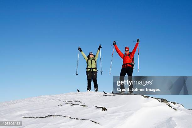 two women on top of mountain, ammarnas, lapland, sweden - sweden snow stock pictures, royalty-free photos & images