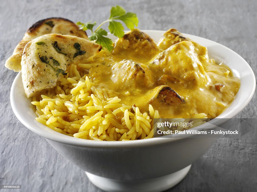 Chicken Passanda curry, pilau rice and naan bread