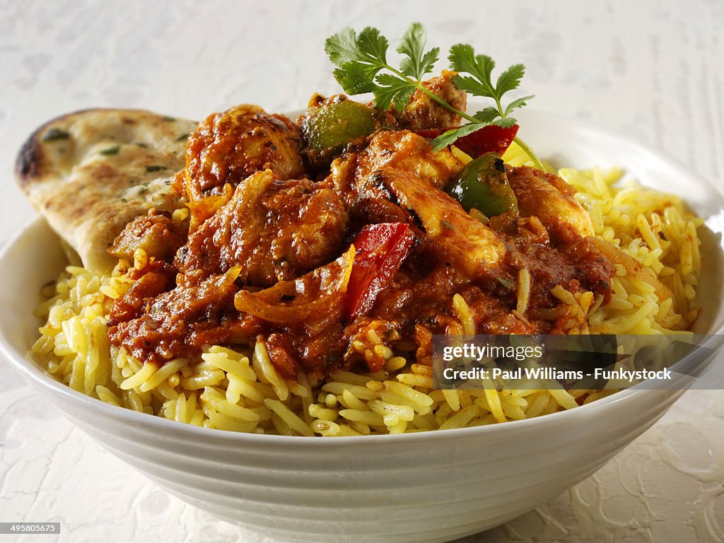 Chicken Jalfrezie Indian curry with pilau rice and naan bread