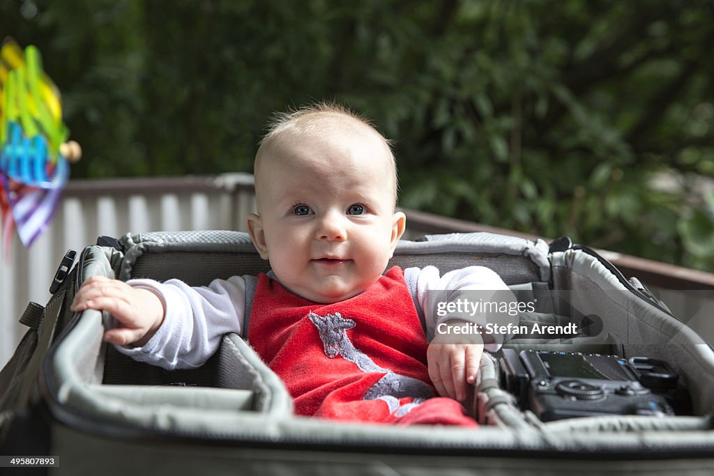 Baby, 4-5 months old, in a bag, Germany