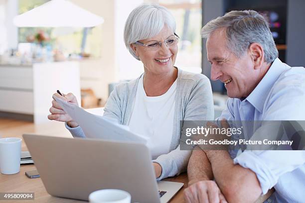 we're well within our budget this month - retirement planning stock pictures, royalty-free photos & images