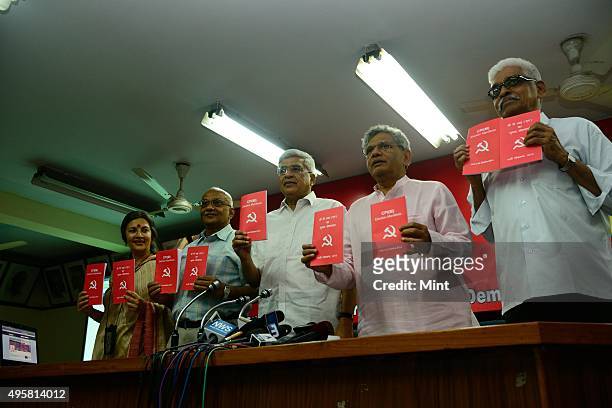Communist Party of India-Marxist or CPM general secretary Prakash Karat and party leader Sitaram Yechury with party members Brinda Karat, S....