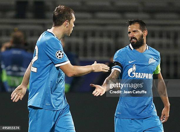 Artem Dzyuba of FC Zenit celebrates scoring his second goal with Danny during the UEFA Champions league match between Olympique Lyonnais and FC Zenit...