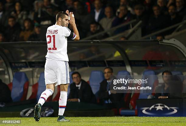 Maxime Gonalons of Lyon thanks the fans after receiving a red card during the UEFA Champions league match between Olympique Lyonnais and FC Zenit St...